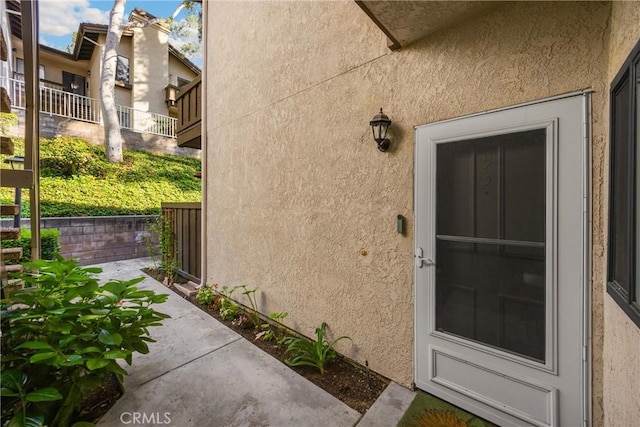22709 Lakeway Dr Unit 493, Diamond Bar, CA 91765 - view of exterior entry featuring stucco siding