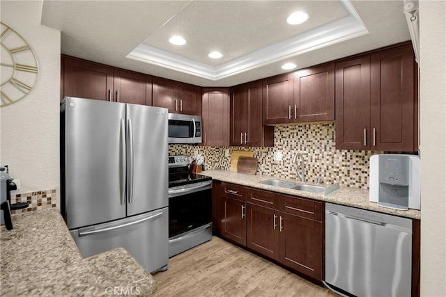 22709 Lakeway Dr Unit 493, Diamond Bar, CA 91765 - kitchen featuring appliances with stainless steel finishes, a raised ceiling, light countertops, backsplash, and recessed lighting