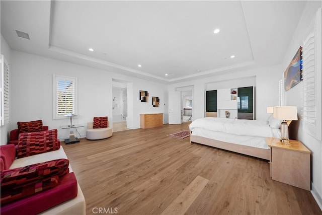127 Interstellar, Irvine, CA 92618 - bedroom with a raised ceiling, wood finished floors, and recessed lighting