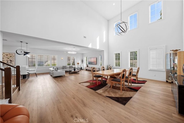 127 Interstellar, Irvine, CA 92618 - dining area with a high ceiling and light wood-style flooring