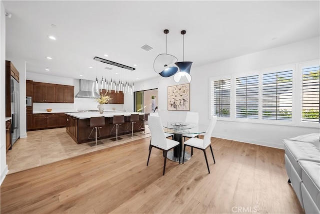 127 Interstellar, Irvine, CA 92618 - dining room featuring light wood finished floors and recessed lighting