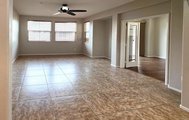 4148 Karst Rd, Carlsbad, CA 92010 - tiled empty room with plenty of natural light and ceiling fan
