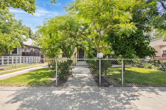 1085 N Arrowhead Ave, San Bernardino, CA 92410 - view of front of home featuring a fenced front yard and stucco siding