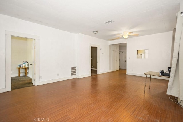 1085 N Arrowhead Ave, San Bernardino, CA 92410 - unfurnished living room with a ceiling fan and wood finished floors