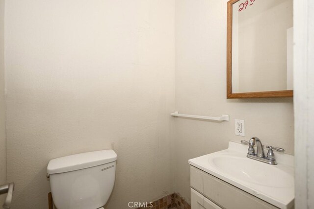 1085 N Arrowhead Ave, San Bernardino, CA 92410 - bathroom featuring vanity and toilet