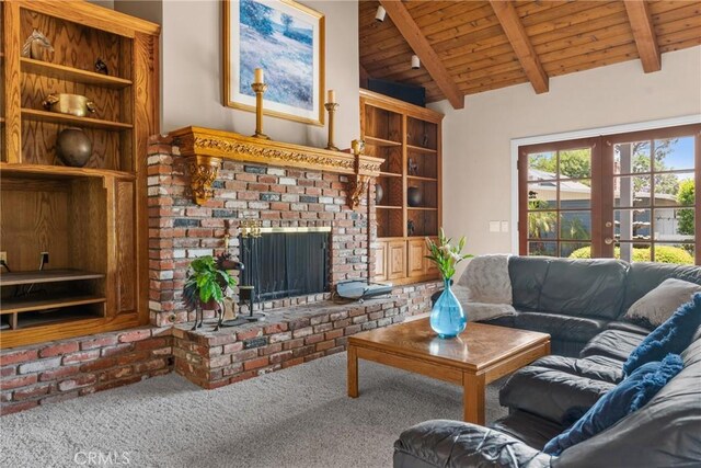 530 Bradbury Rd, Monrovia, CA 91016 - carpeted living area featuring wooden ceiling and a brick fireplace
