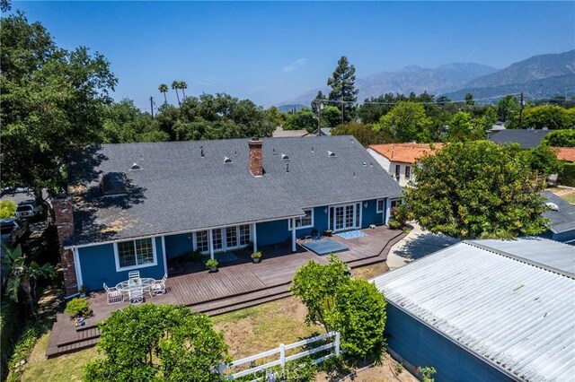 530 Bradbury Rd, Monrovia, CA 91016 - rear view of property with a deck with mountain view, french doors, and a chimney