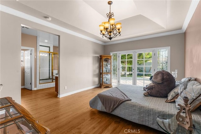 530 Bradbury Rd, Monrovia, CA 91016 - bedroom with a chandelier, wood finished floors, a raised ceiling, access to exterior, and ornamental molding