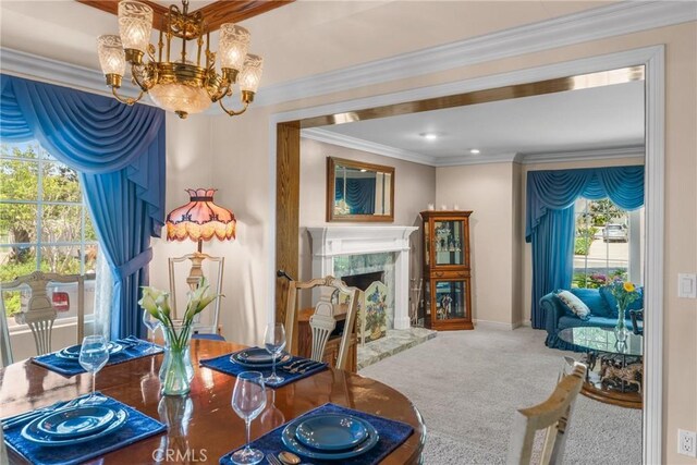 530 Bradbury Rd, Monrovia, CA 91016 - carpeted dining room featuring a chandelier, crown molding, a fireplace, and recessed lighting