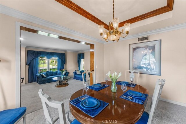 530 Bradbury Rd, Monrovia, CA 91016 - dining room with carpet flooring, a chandelier, ornamental molding, and a tray ceiling