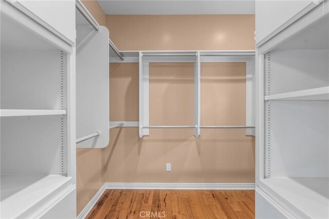 530 Bradbury Rd, Monrovia, CA 91016 - walk in closet featuring wood finished floors