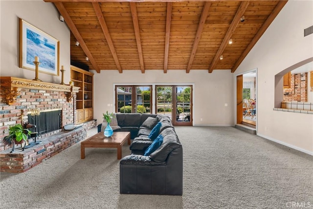 530 Bradbury Rd, Monrovia, CA 91016 - carpeted living area with a wooden ceiling with exposed beams, a brick fireplace, high vaulted ceiling, and arched walkways