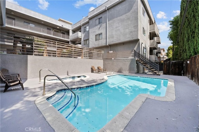 4706 Sepulveda Blvd, Sherman Oaks, CA 91403 - community pool featuring stairs, a patio area, and a community hot tub
