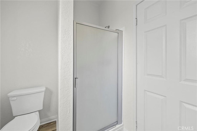 4706 Sepulveda Blvd, Sherman Oaks, CA 91403 - bathroom featuring a stall shower and wood finished floors