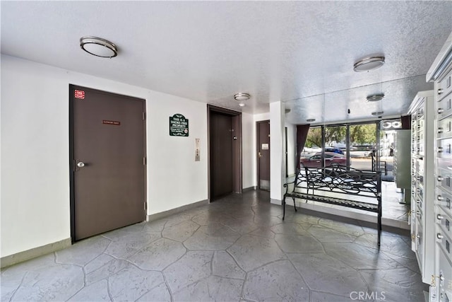 4706 Sepulveda Blvd, Sherman Oaks, CA 91403 - hall with elevator and a textured ceiling