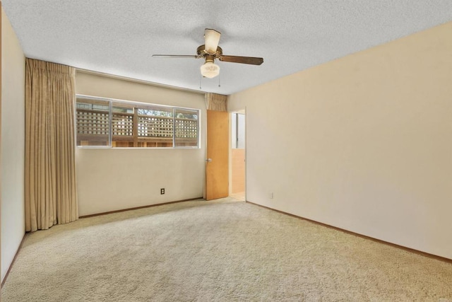 3448 Goldfinch St, San Diego, CA 92103 - carpeted spare room with a ceiling fan and a textured ceiling