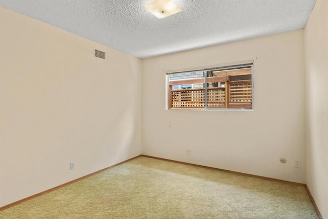 3448 Goldfinch St, San Diego, CA 92103 - spare room with carpet floors and a textured ceiling