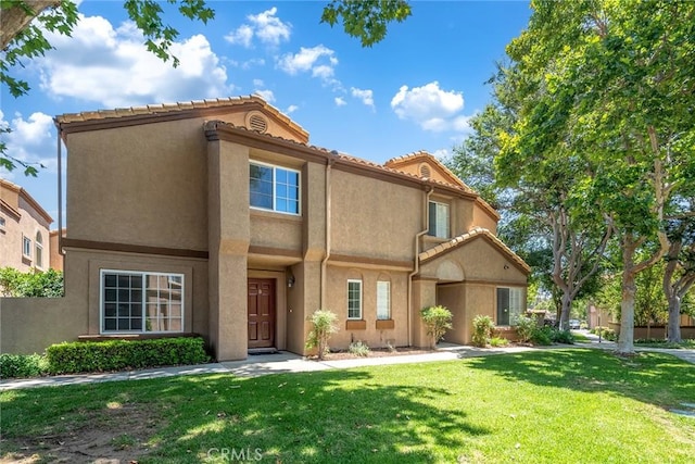14711 Moon Crest Ln Unit B, Chino Hills, CA 91709 - view of front of home with stucco siding and a front yard