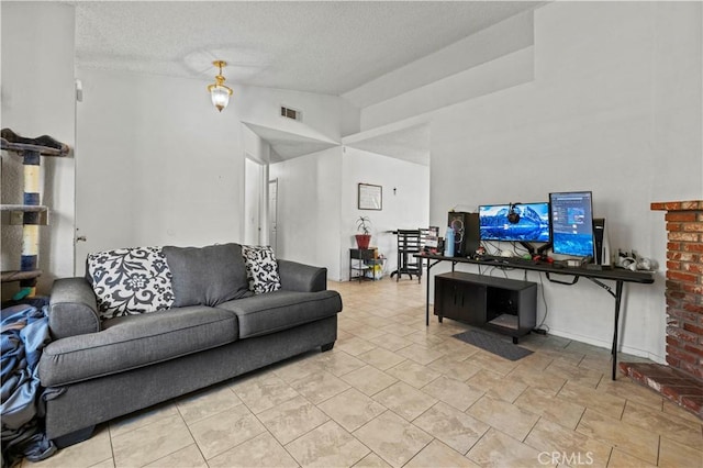2021 Buckwheat Ave, Rosamond, CA 93560 - living room featuring a textured ceiling and lofted ceiling