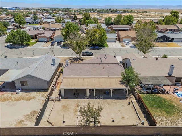 2021 Buckwheat Ave, Rosamond, CA 93560 - aerial perspective of suburban area with a mountain backdrop
