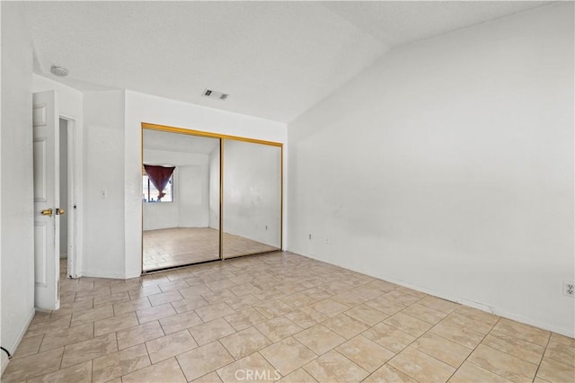 2021 Buckwheat Ave, Rosamond, CA 93560 - unfurnished bedroom with lofted ceiling and a closet