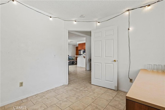2021 Buckwheat Ave, Rosamond, CA 93560 - empty room with a textured ceiling and a smoke detector