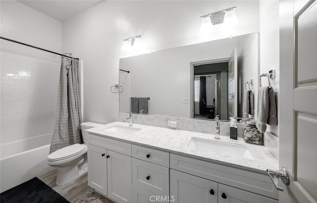 825 Spring St W, Madera, CA 93636 - full bathroom with shower / bath combo, double vanity, and wood finished floors