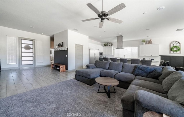 825 Spring St W, Madera, CA 93636 - living room featuring ceiling fan and light wood-type flooring