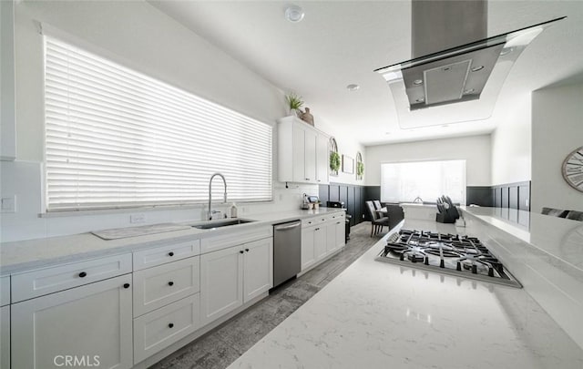 825 Spring St W, Madera, CA 93636 - kitchen featuring appliances with stainless steel finishes, white cabinets, and light stone countertops