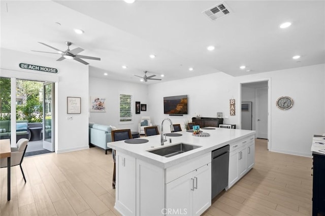 3100 Rivington, Irvine, CA 92612 - kitchen featuring stainless steel dishwasher, a ceiling fan, open floor plan, plenty of natural light, and recessed lighting