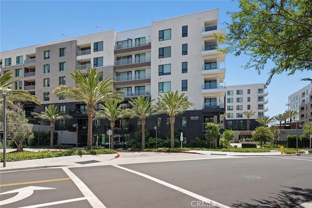 3100 Rivington, Irvine, CA 92612 - view of apartment building / complex with uncovered parking
