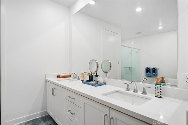 3100 Rivington, Irvine, CA 92612 - bathroom featuring double vanity, a stall shower, and recessed lighting