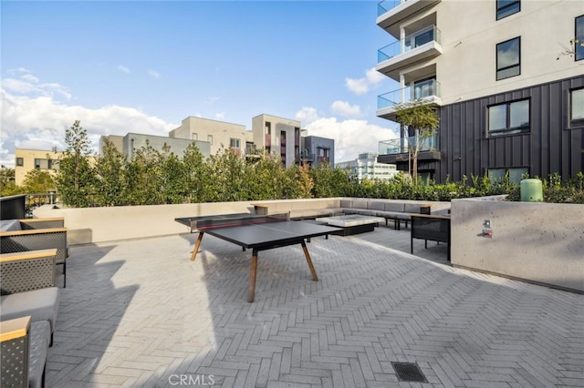 3100 Rivington, Irvine, CA 92612 - view of patio with an outdoor living space with a fire pit