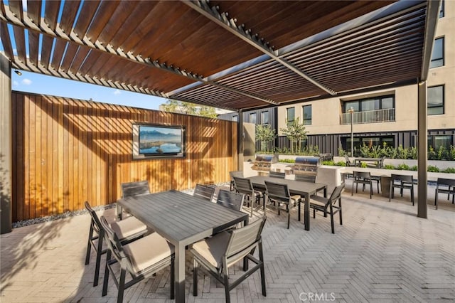 3100 Rivington, Irvine, CA 92612 - view of patio with outdoor dining area, a pergola, and exterior kitchen