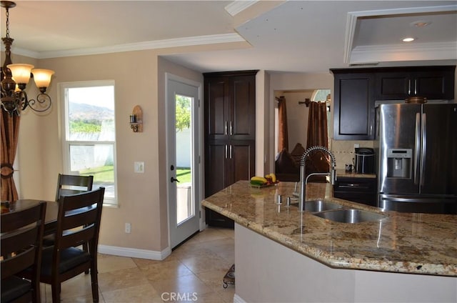 25592 Aragon Way, Yorba Linda, CA 92887 - kitchen featuring stainless steel fridge with ice dispenser, crown molding, light stone countertops, light tile patterned floors, and decorative light fixtures