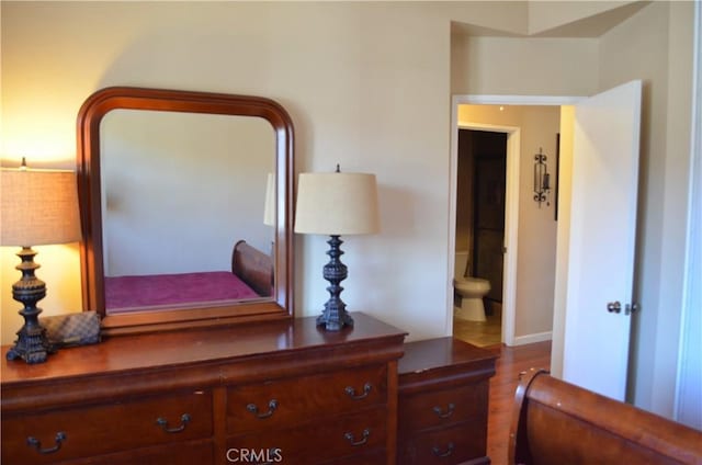 25592 Aragon Way, Yorba Linda, CA 92887 - bedroom with dark wood-type flooring and connected bathroom