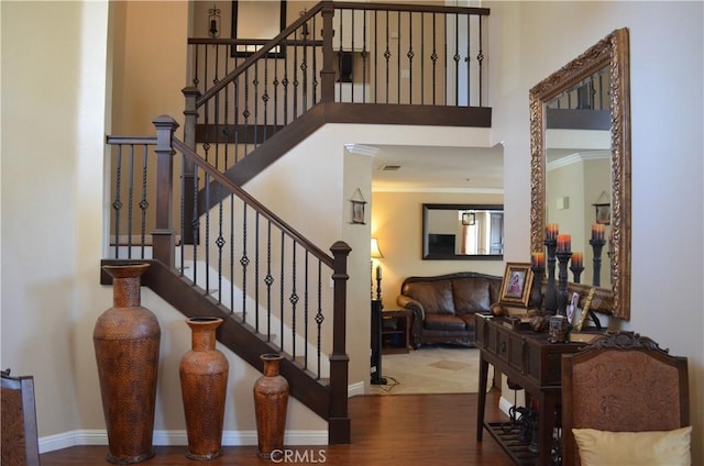 25592 Aragon Way, Yorba Linda, CA 92887 - stairway with a towering ceiling, wood finished floors, and ornamental molding