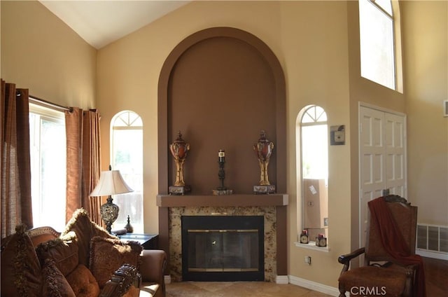25592 Aragon Way, Yorba Linda, CA 92887 - living area featuring high vaulted ceiling, arched walkways, and a high end fireplace