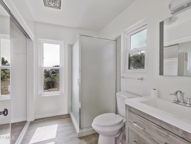 3914 Alta Vista Dr, La Canada Flintridge, CA 91011 - full bath featuring vanity, wood finished floors, and a stall shower