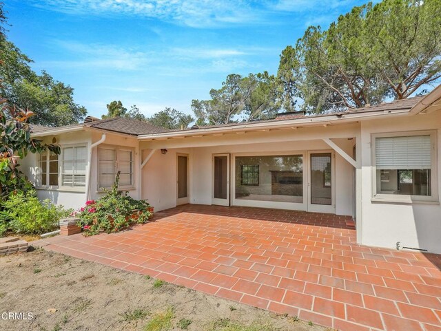 3914 Alta Vista Dr, La Canada Flintridge, CA 91011 - rear view of house featuring a patio area and stucco siding
