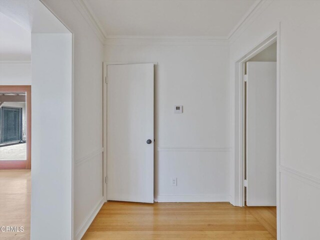 3914 Alta Vista Dr, La Canada Flintridge, CA 91011 - hallway featuring light wood finished floors and ornamental molding
