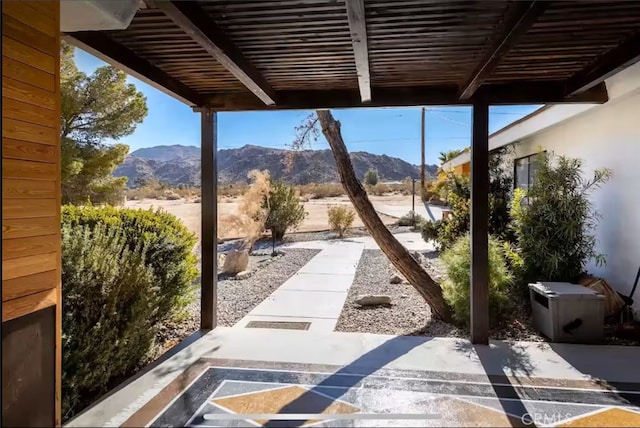 70138 Sullivan Rd Unit 29, Palms, CA 92277 - view of patio featuring a mountain view