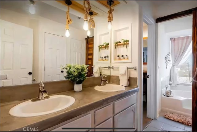 70138 Sullivan Rd Unit 29, Palms, CA 92277 - full bathroom with double vanity, tile patterned floors, and a bathtub