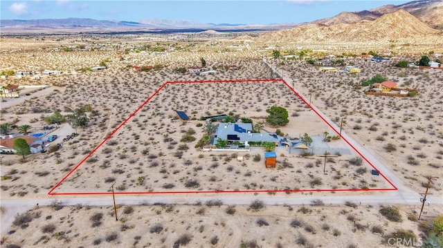 70138 Sullivan Rd Unit 29, Palms, CA 92277 - aerial view of sparsely populated area with a desert landscape and property boundaries highlighted