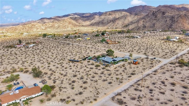 70138 Sullivan Rd Unit 29, Palms, CA 92277 - aerial view of sparsely populated area with a desert landscape and a mountainous background