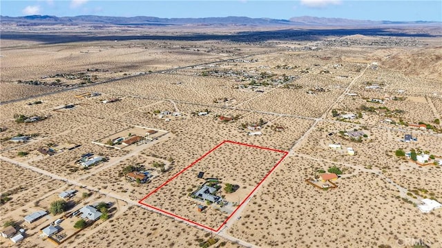 70138 Sullivan Rd Unit 29, Palms, CA 92277 - overview of rural landscape featuring a desert landscape and property boundaries highlighted