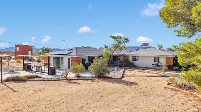 70138 Sullivan Rd Unit 29, Palms, CA 92277 - view of front of home with solar panels