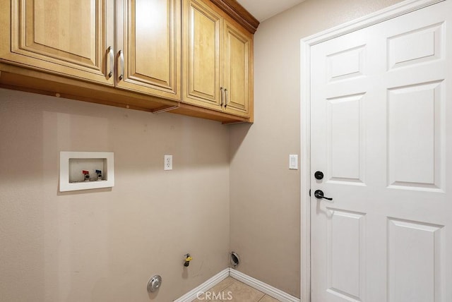 117 S Machala Pl, Rialto, CA 92376 - laundry room featuring cabinet space, hookup for a gas dryer, hookup for a washing machine, and tile patterned flooring
