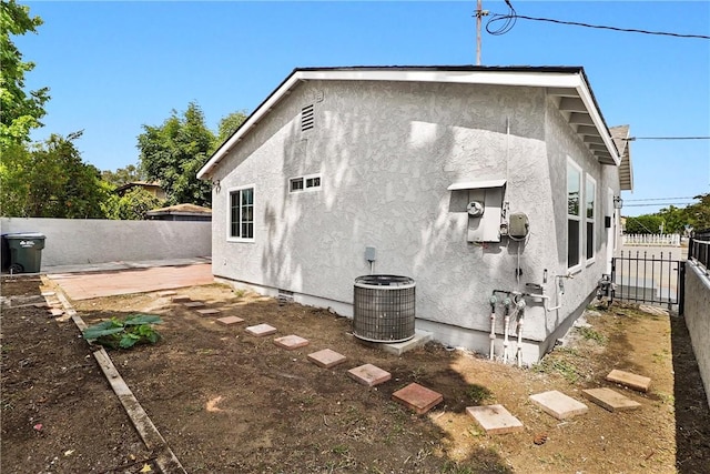 339 E 8th St, Azusa, CA 91702 - rear view of house with a fenced backyard, stucco siding, and a patio