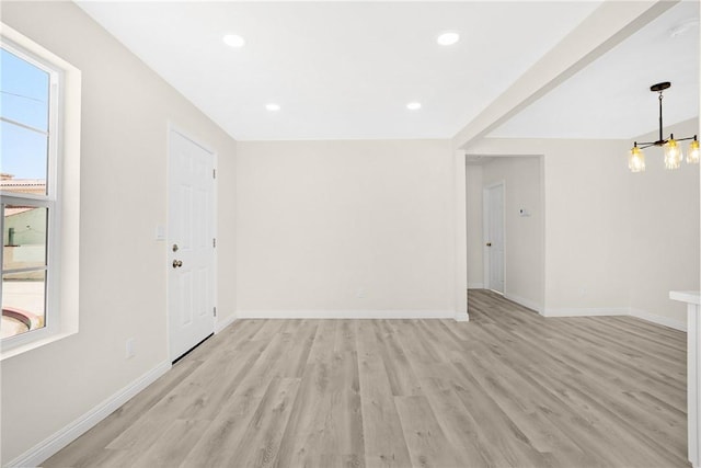 339 E 8th St, Azusa, CA 91702 - empty room featuring a chandelier, light wood finished floors, and recessed lighting